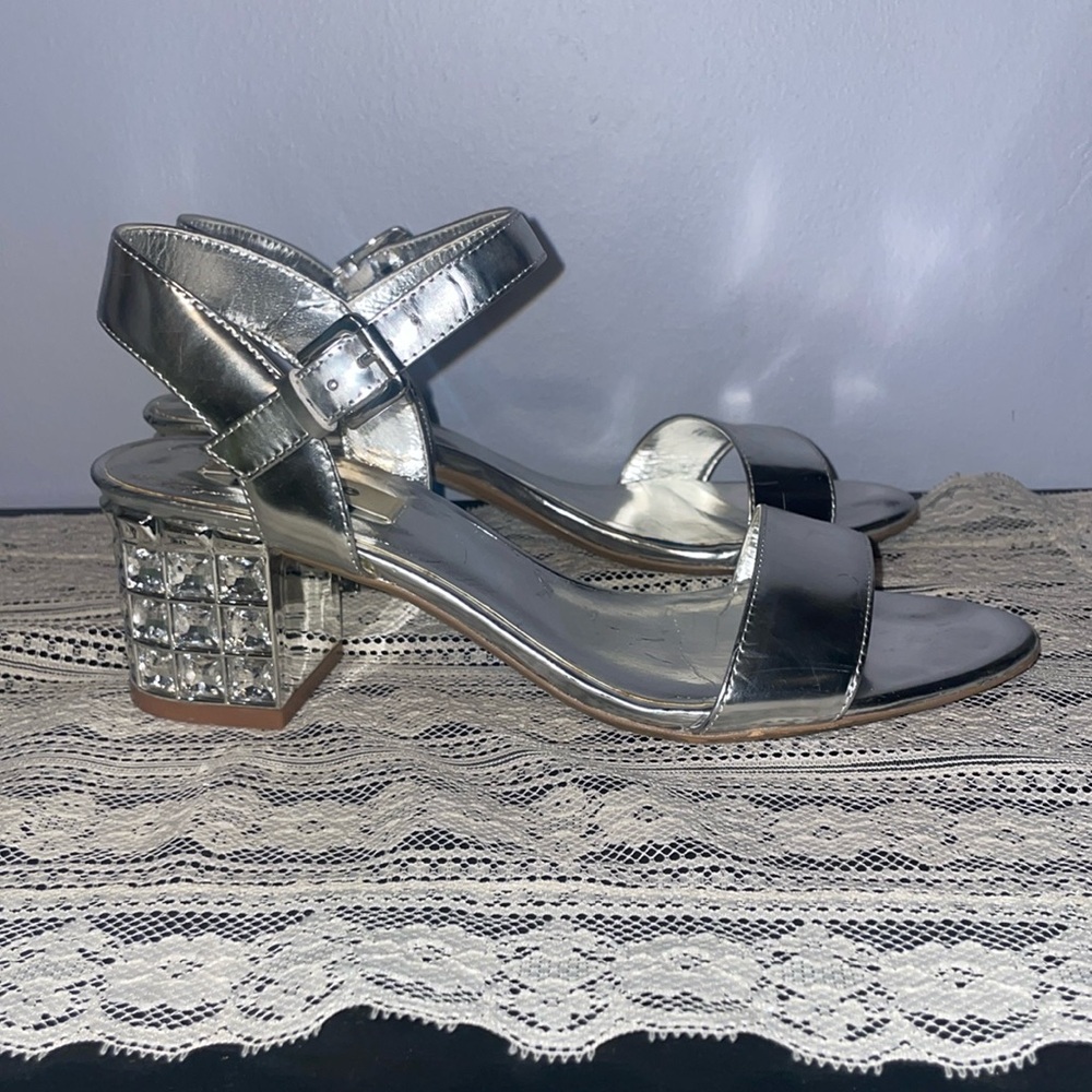 Silver leather Dune London sandals with glass jeweled block heels.